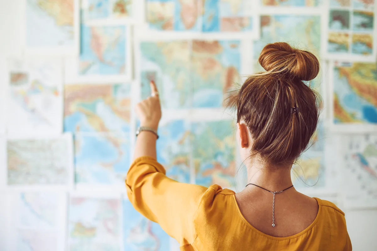 Young woman looking at map