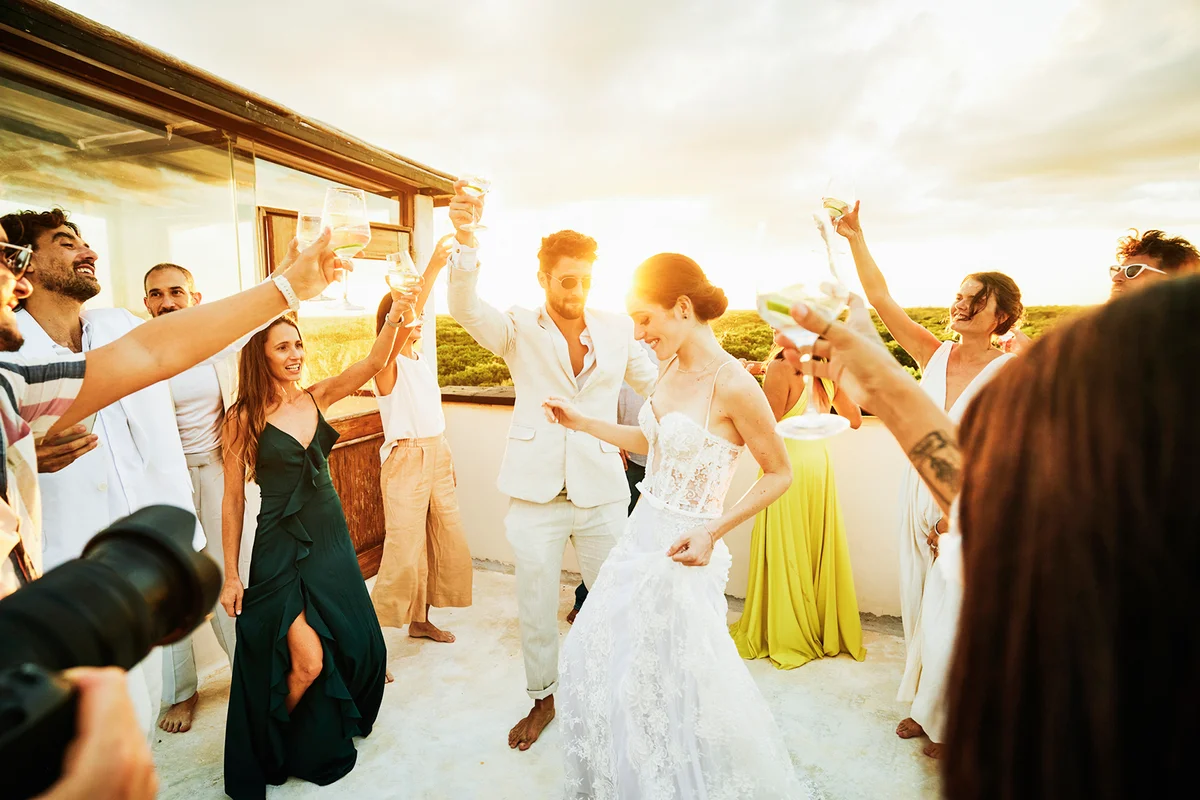 bride and groom dancing and celebrating
