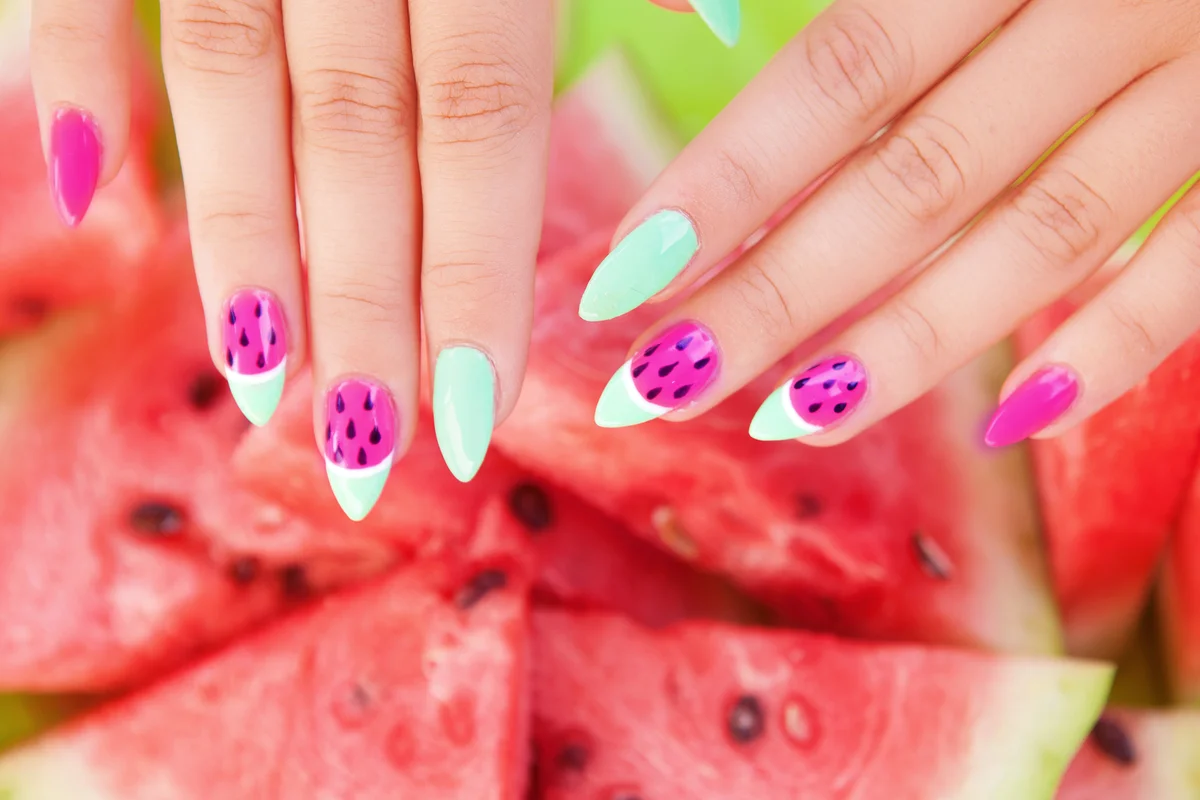 Young woman with watermelon nails
