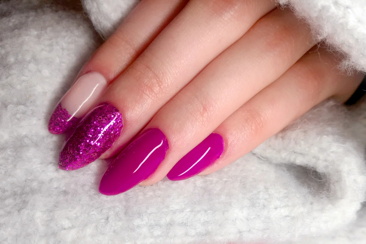 Woman Fingers With Nail Art Manicure In Pink Colour