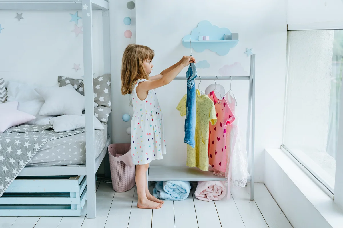 child choosing clothes