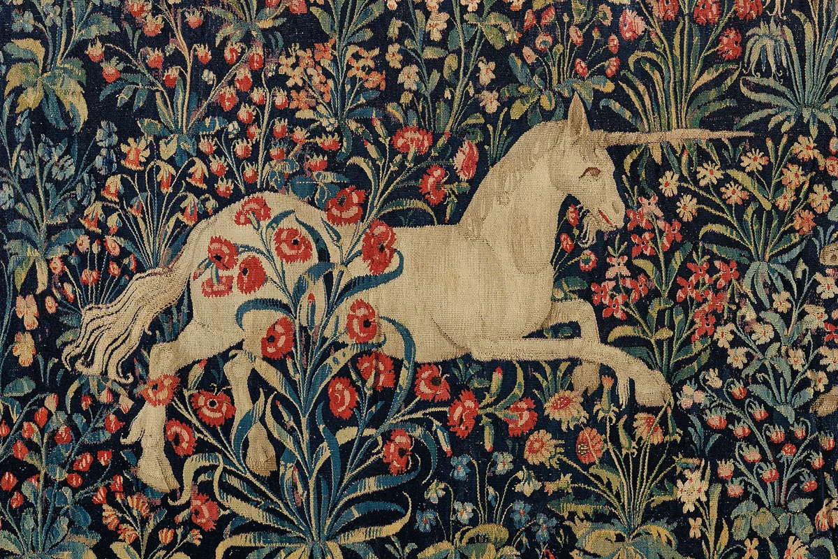 A Unicorn In A Field Of Flowers