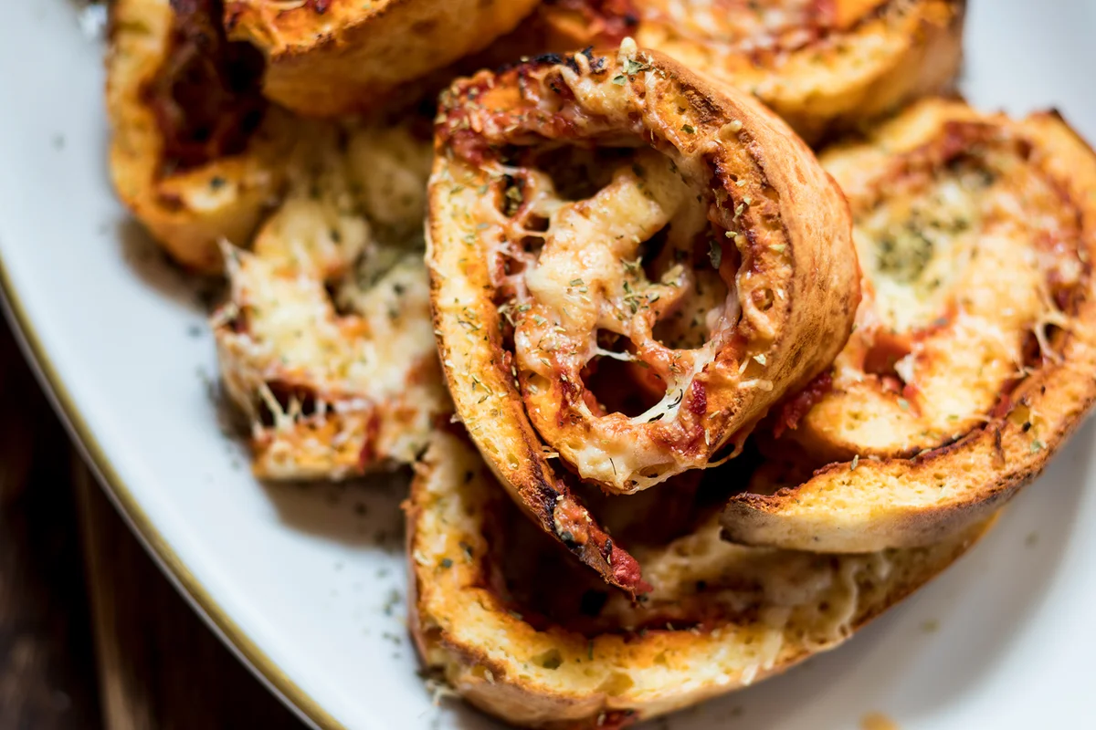 Low carb pizza rolls with ham, cheese and tomato sauce