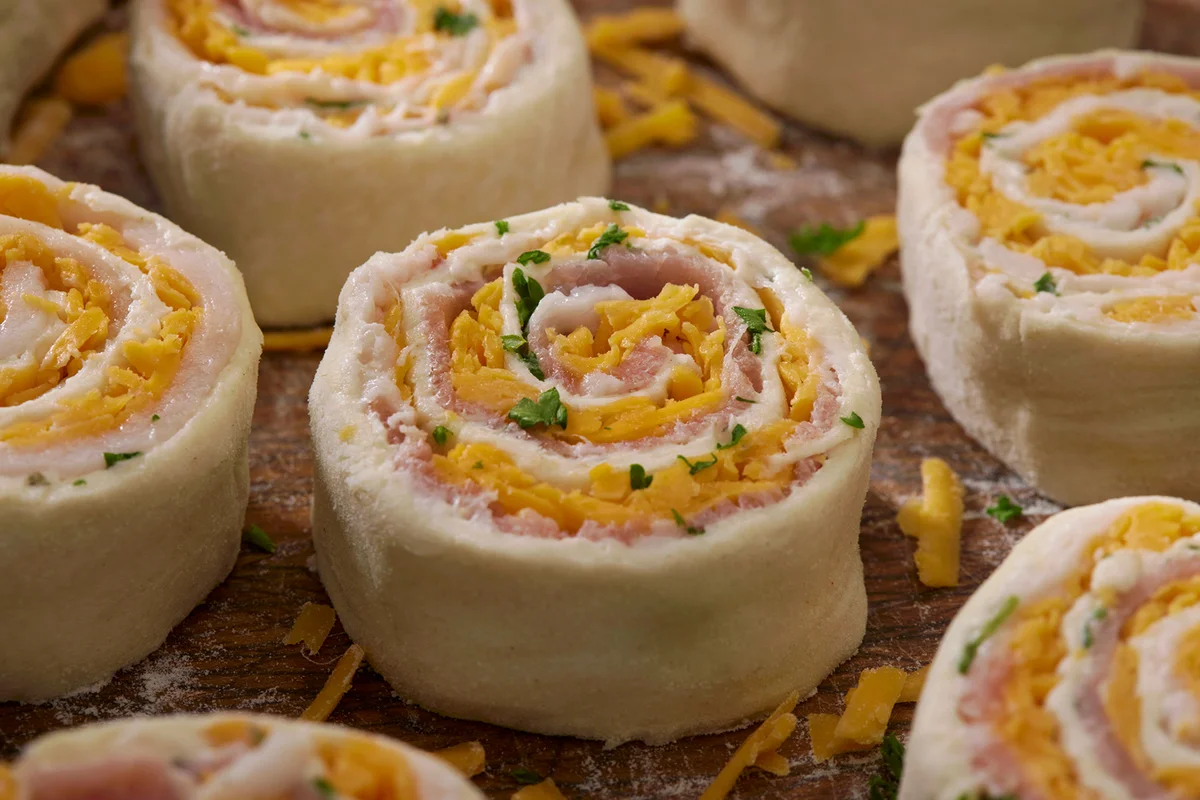 Preparing Ham and Cheese Pinwhees