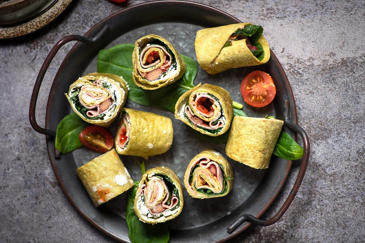 Tortilla wrap with ham,cheese and tomatoes