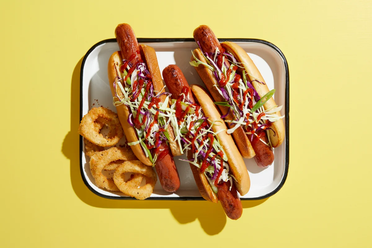 gourmet hotdogs on a tray