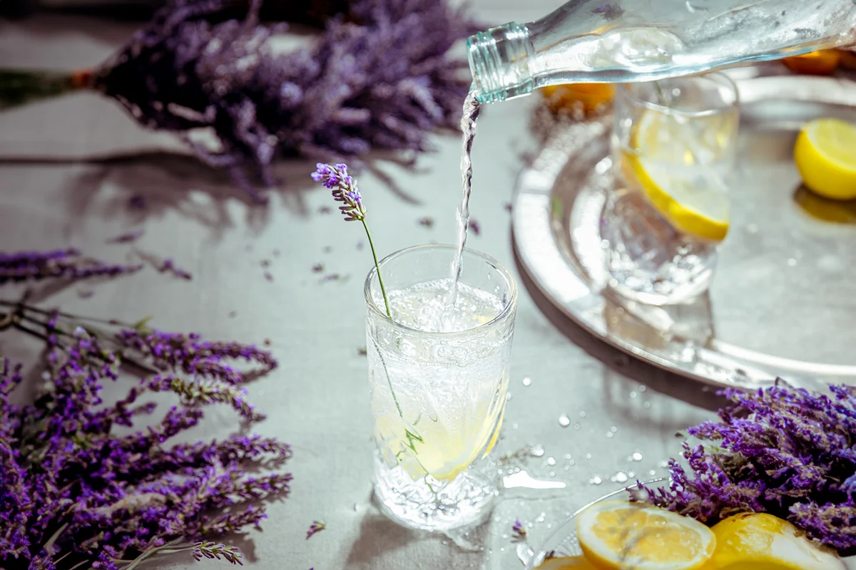 drink pouring in glass on table