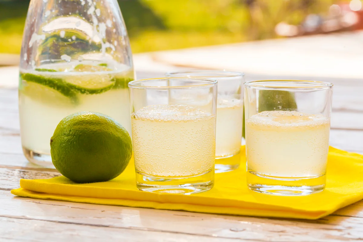 Glasses and carafe of homemade lime lemonade
