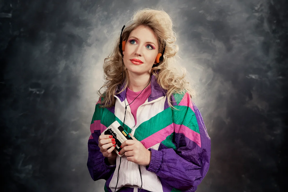 80's woman in shell suit listening to generic Walkman
