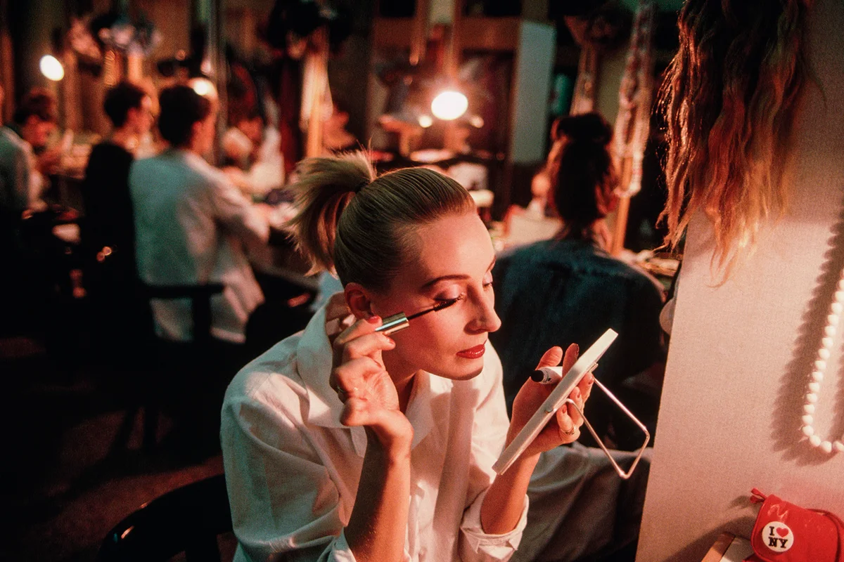 Fashion Model Applying Eyeliner