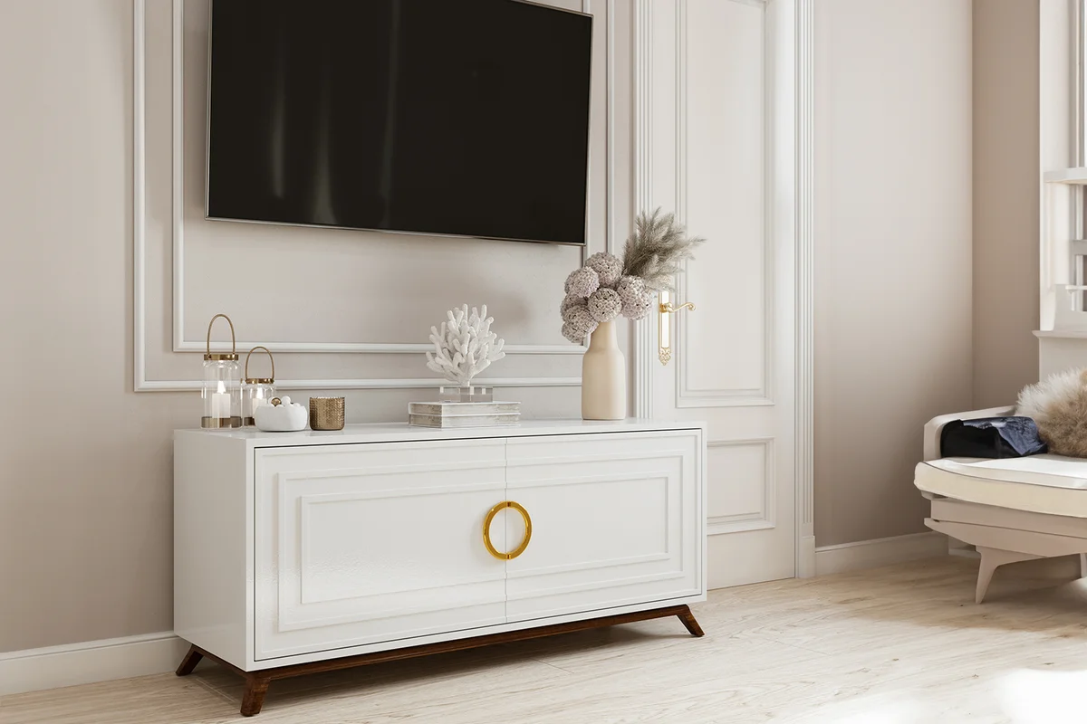 Modern living room with flat-screen TV and wooden dresser.