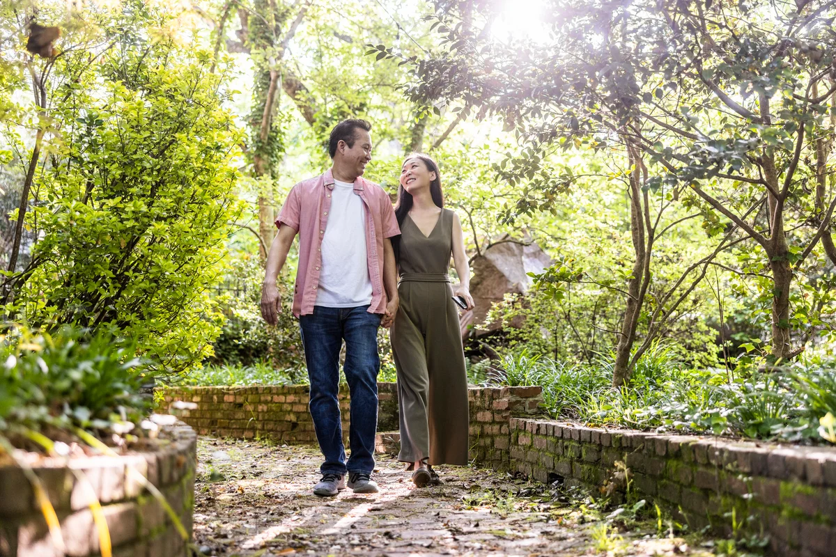 couple walking in garden