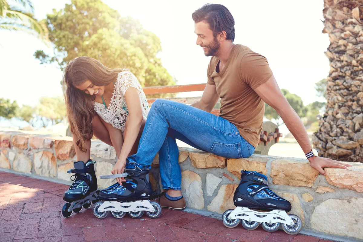 couple getting ready to roller blade