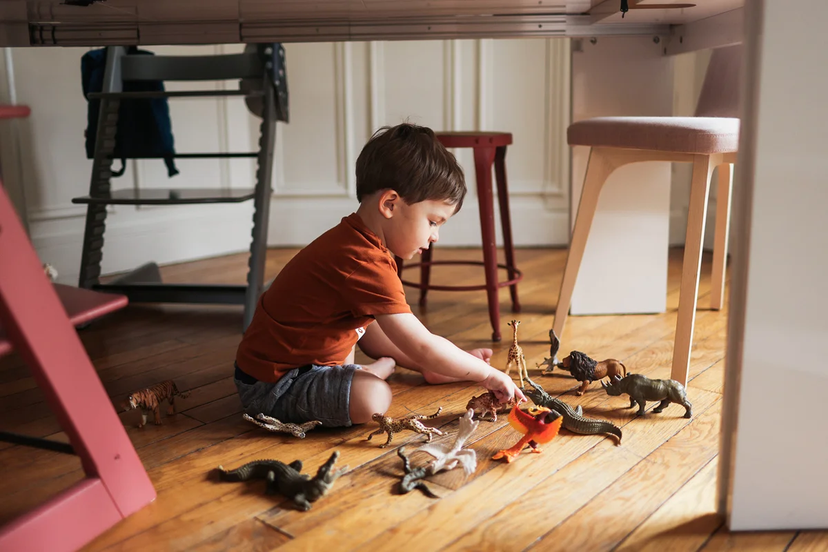 A 3 year old little boy at home