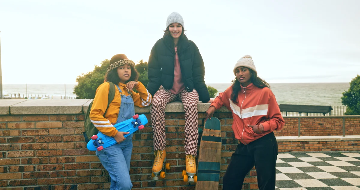 three friends wearing streetwear