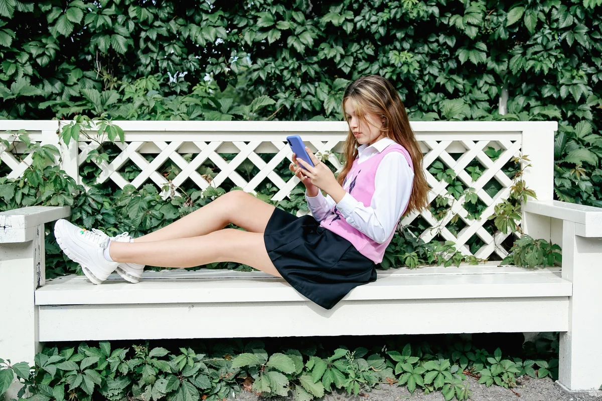 teen girl in a preppy outfit