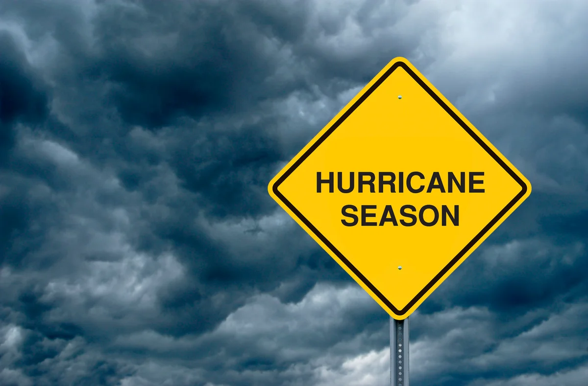 caution sign reading "Hurricane Season"