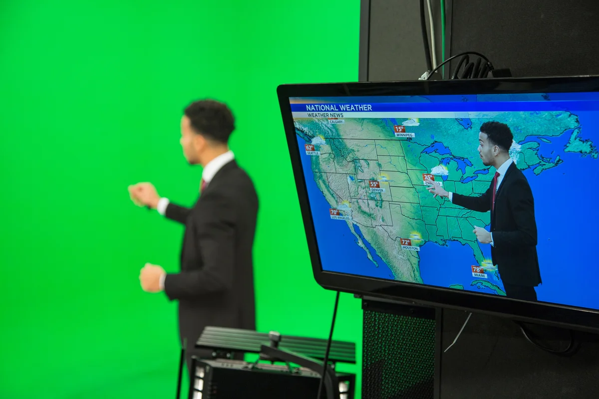 man presenting the weather forecast