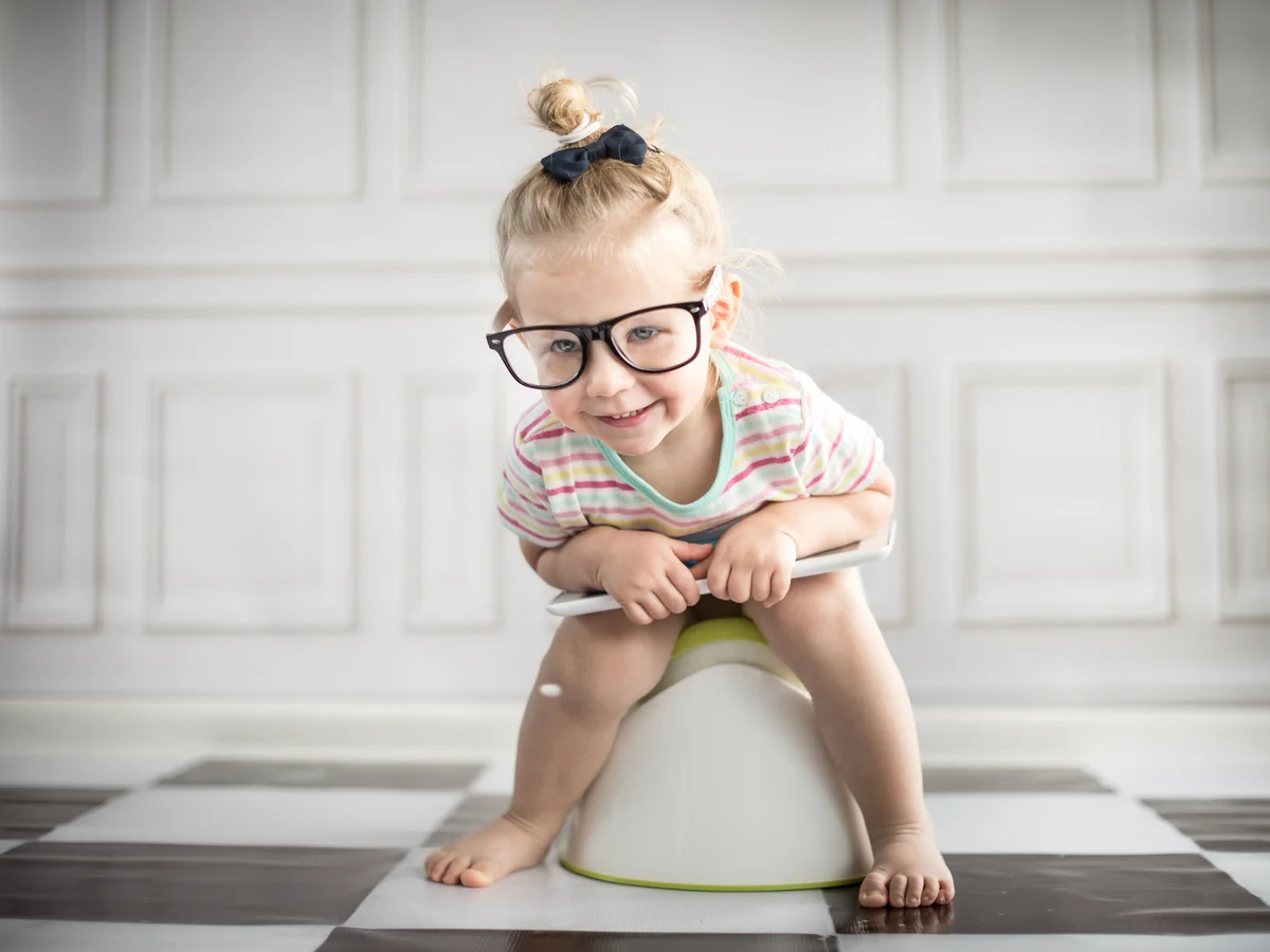toddler girl on potty