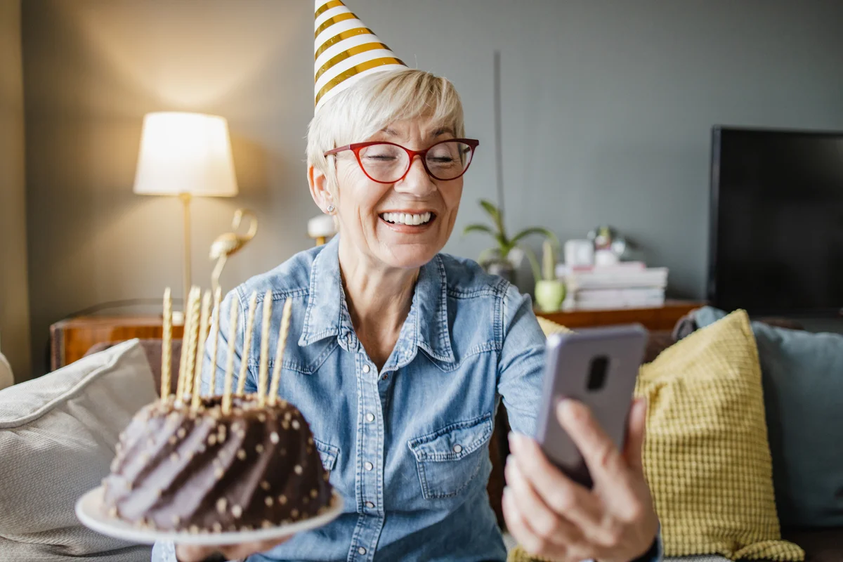 woman with birthday bundt cake