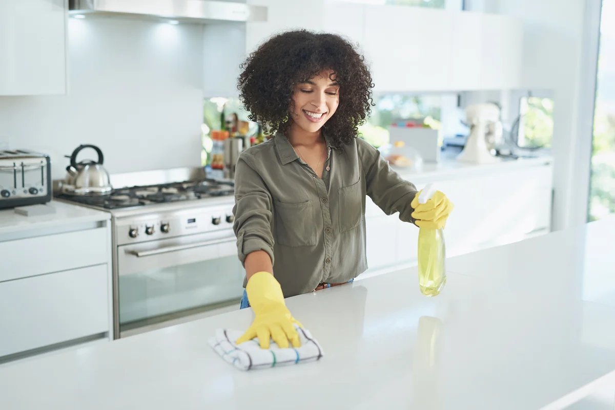 woman cleaning her kitchen