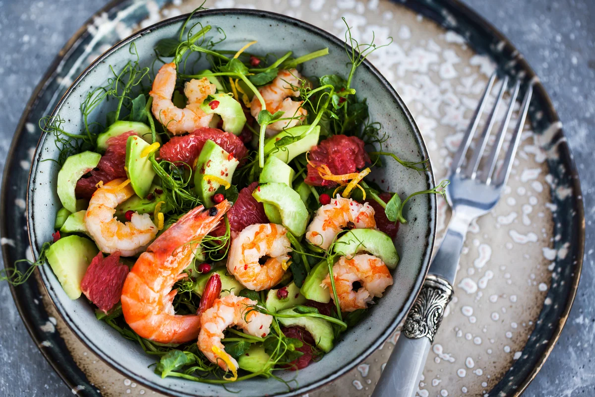 green salad topped with prawns