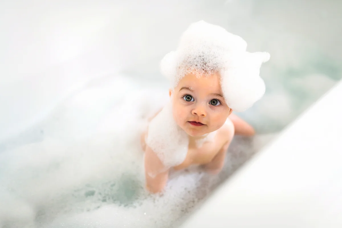 toddler in bath