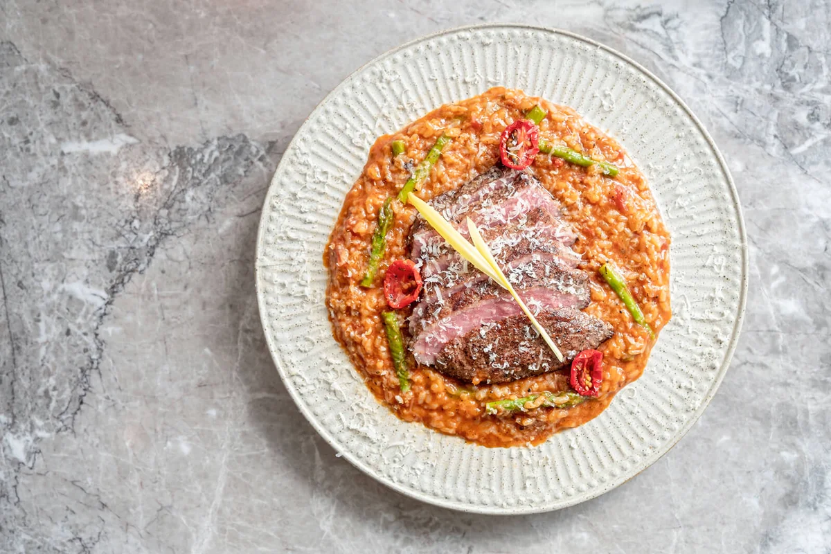 Steak on risotto dish
