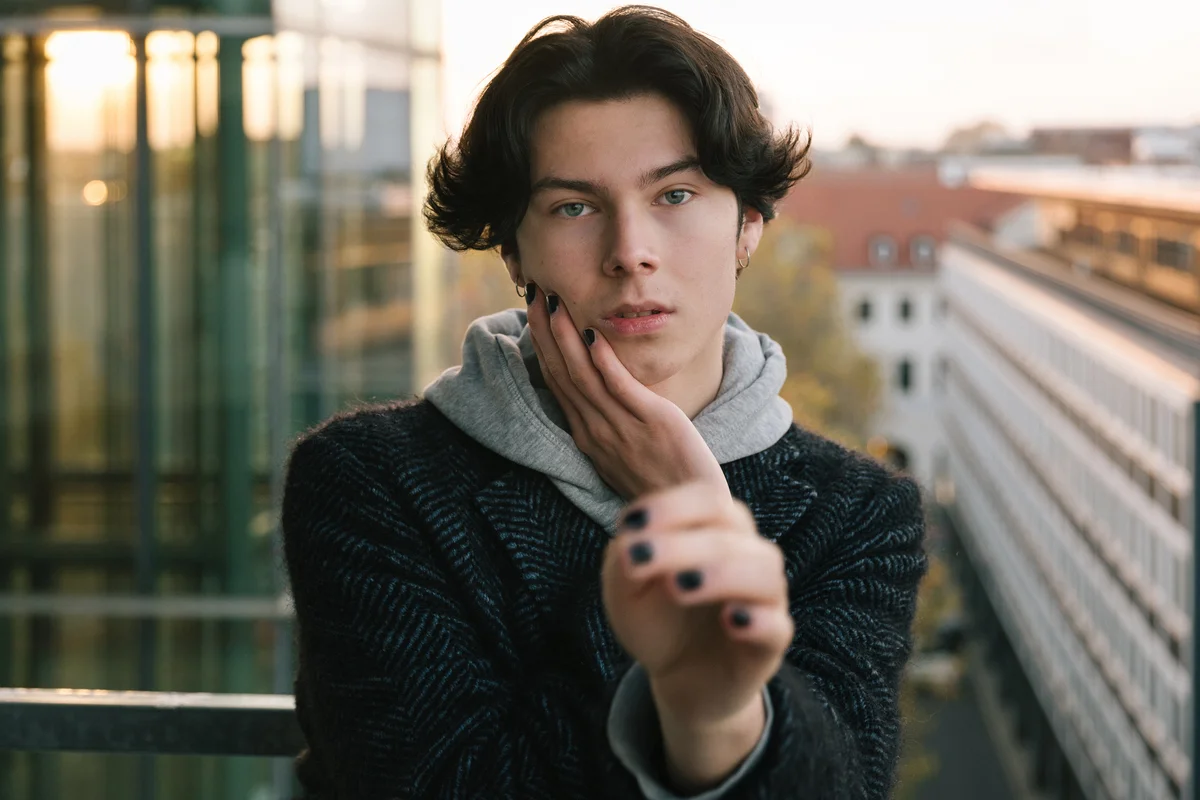 Portrait of young person with ambiguous gaze