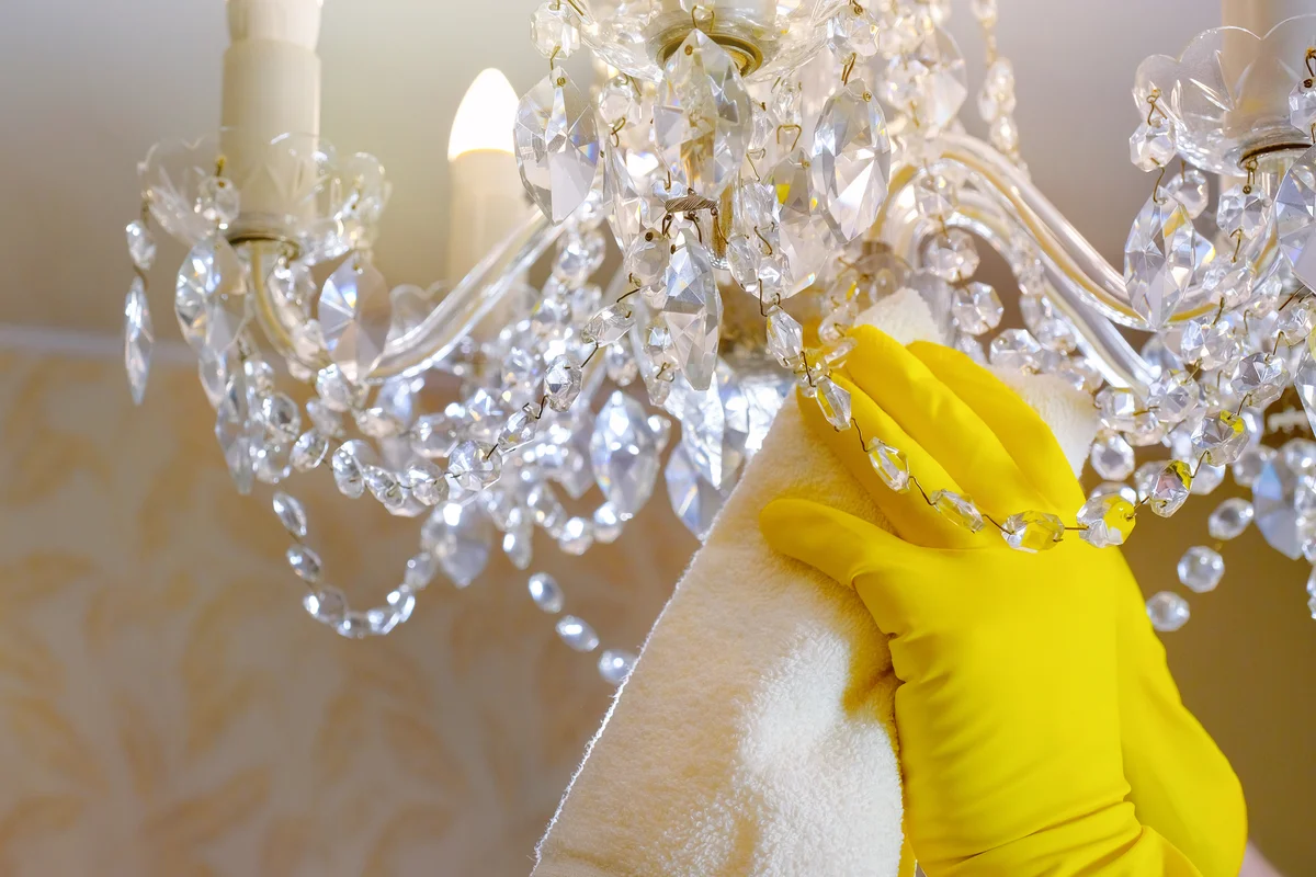Cleaning a chandelier