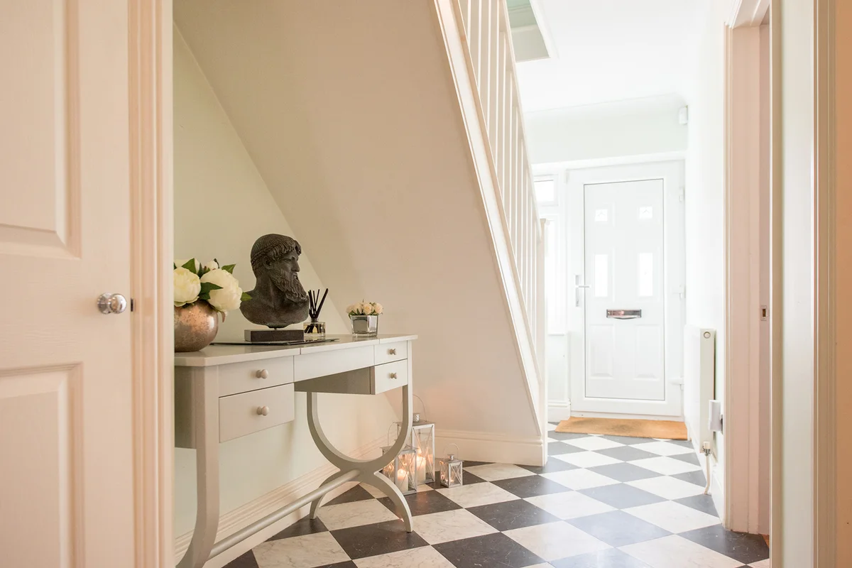 A general view of a a bright hallway within a home.
