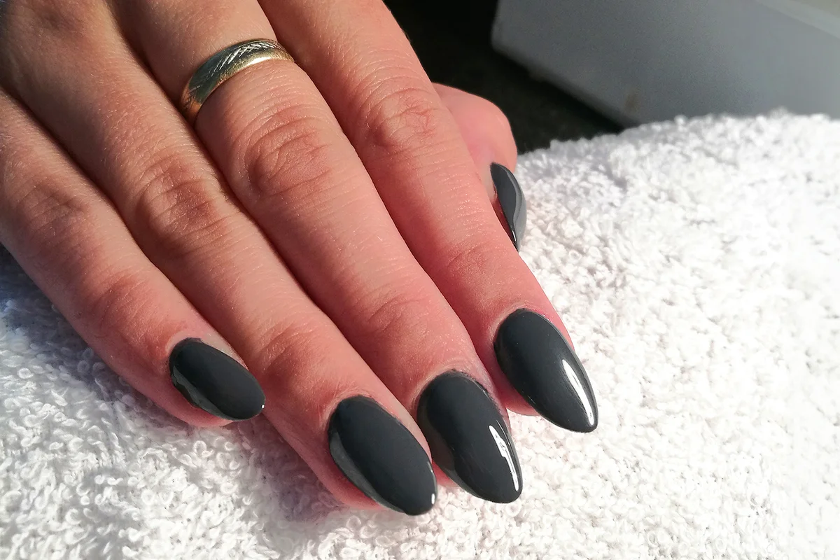 Close-Up Of Woman Fingers With Nail Art Manicure