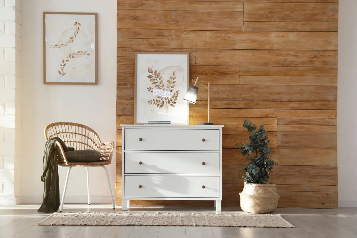 White three drawer dresser in stylish room