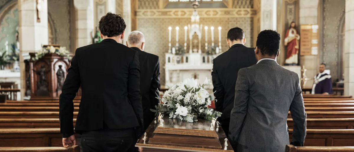 pallbearers at a funeral