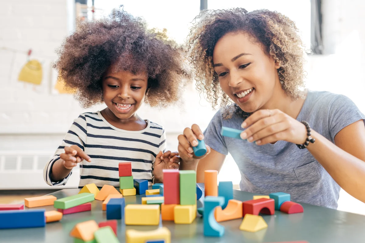 mom and child playing