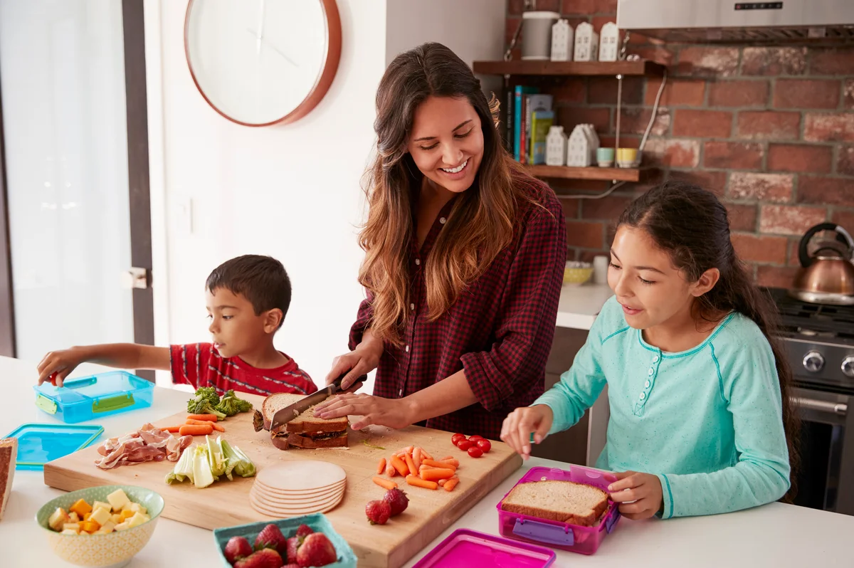 mom and kids making lunches