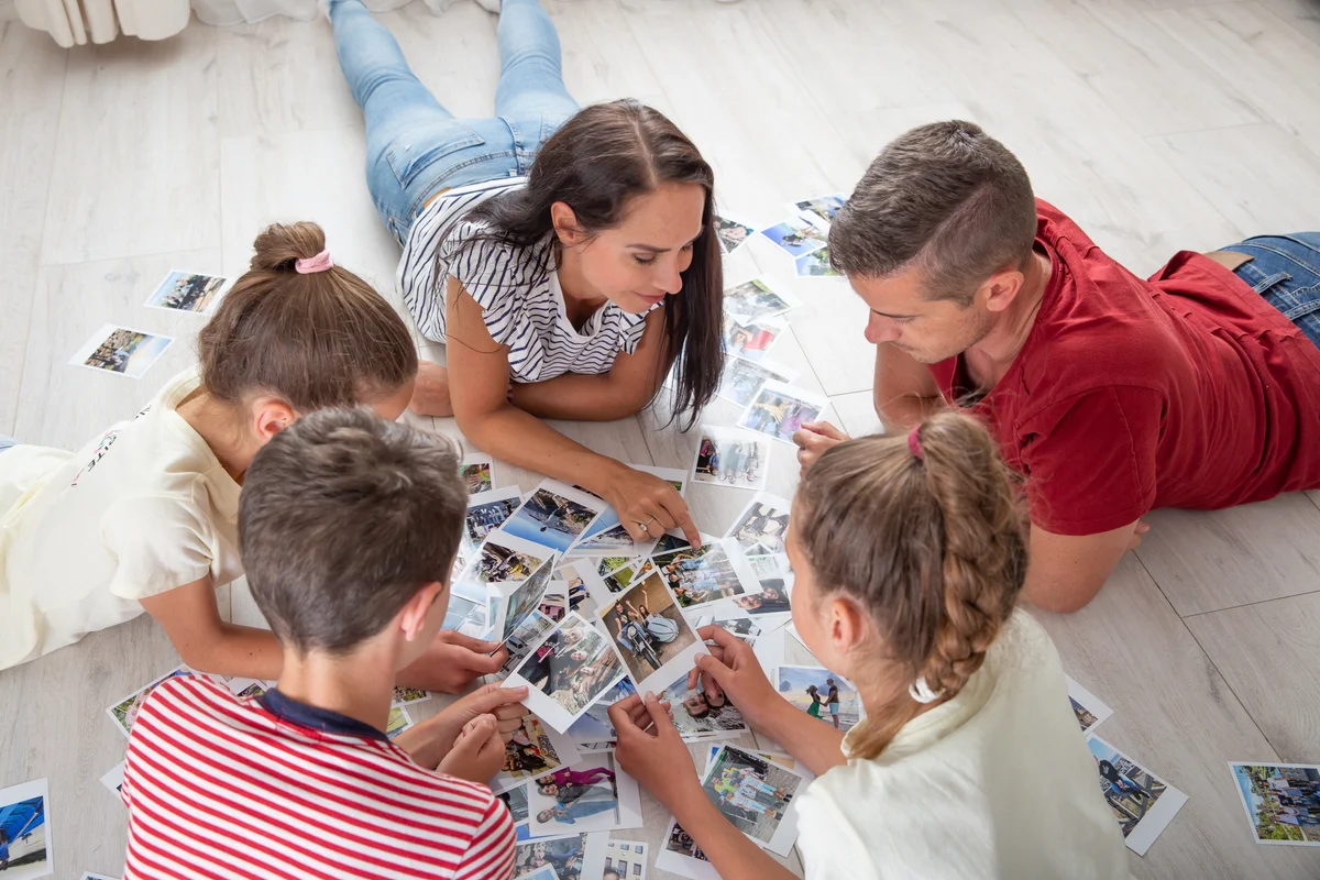 family sorting pictures
