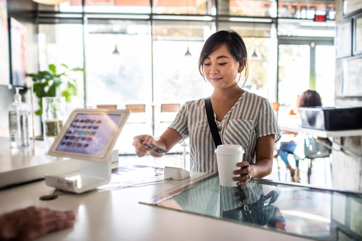 woman buying coffee