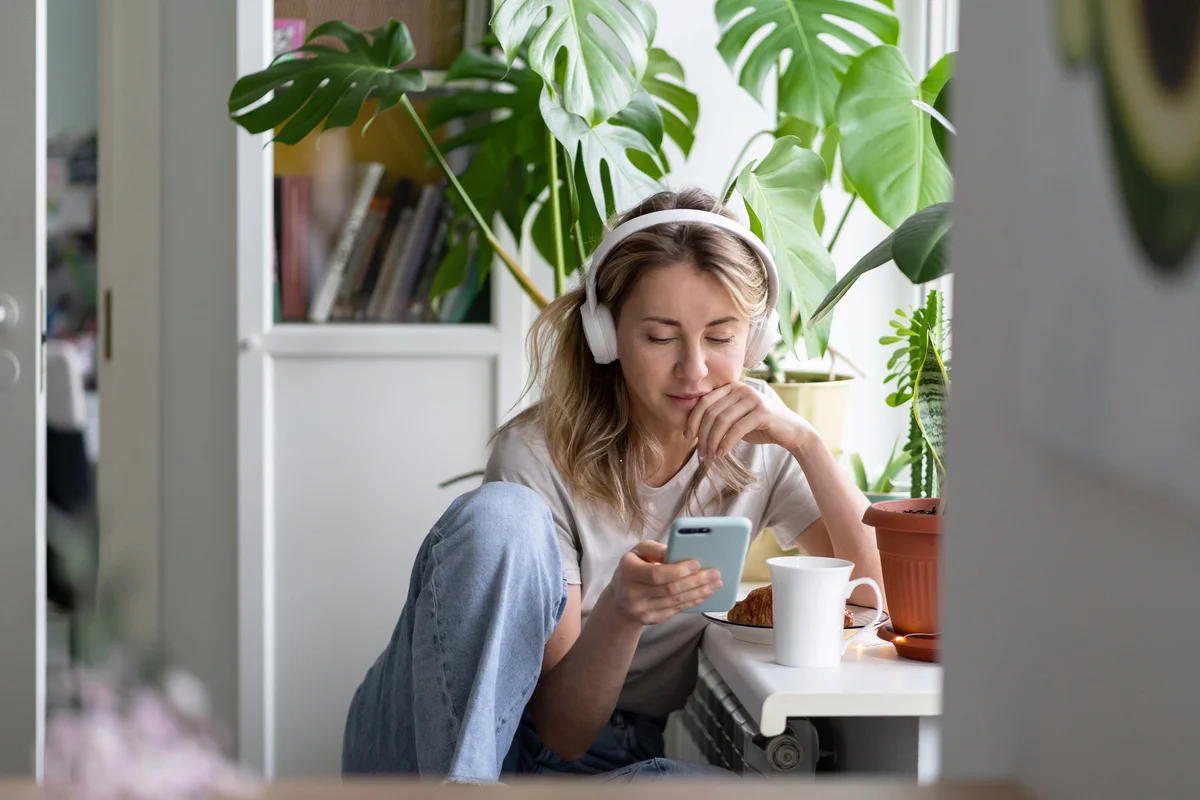 Woman listening to podcast
