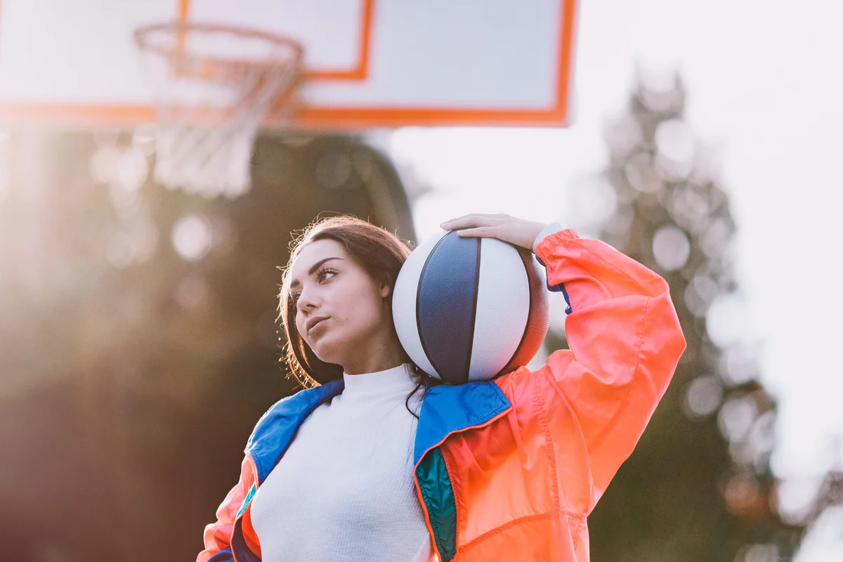 90s girl playing basketball