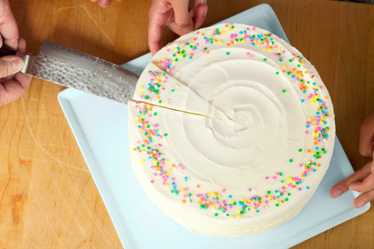 Cutting a decorative cake