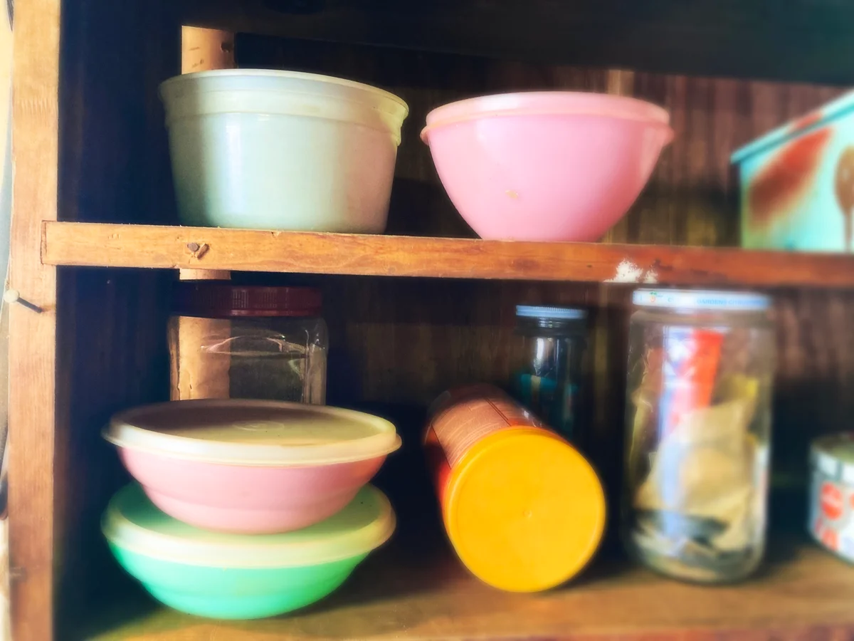 vintage Tupperware in cupboard