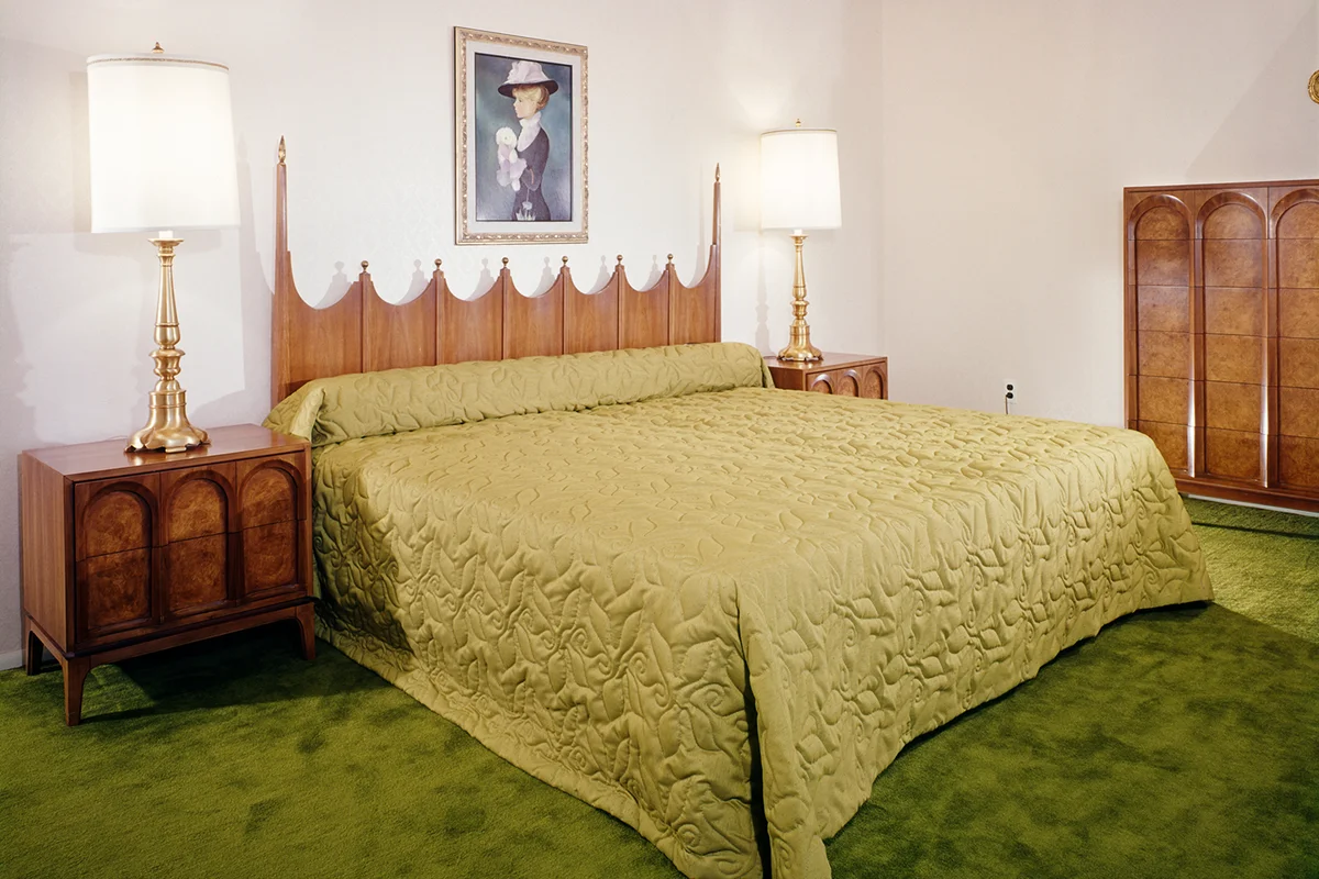 1970s BEDROOM WITH AVOCADO GREEN BEDSPREAD AND CARPETING