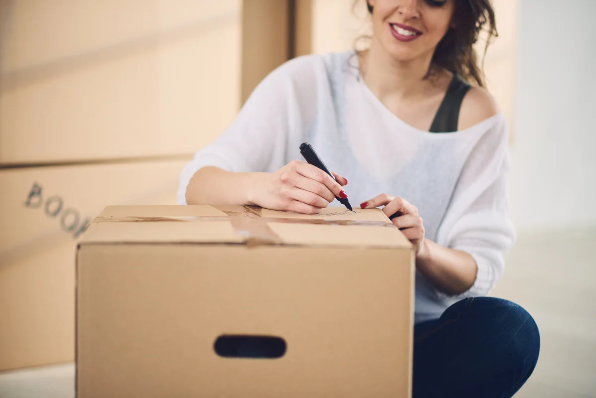student packing boxes