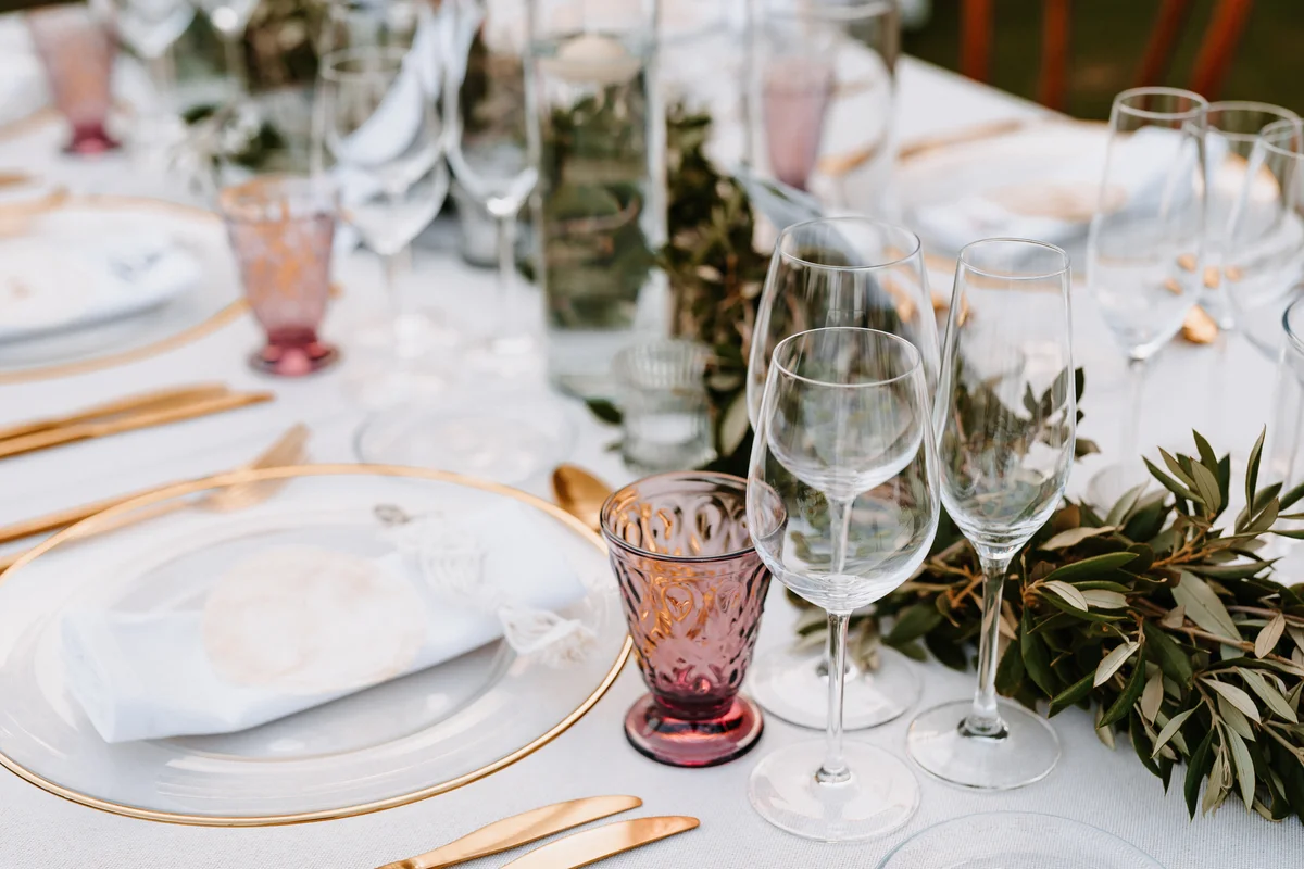 Colored antique glass on decorated wedding table