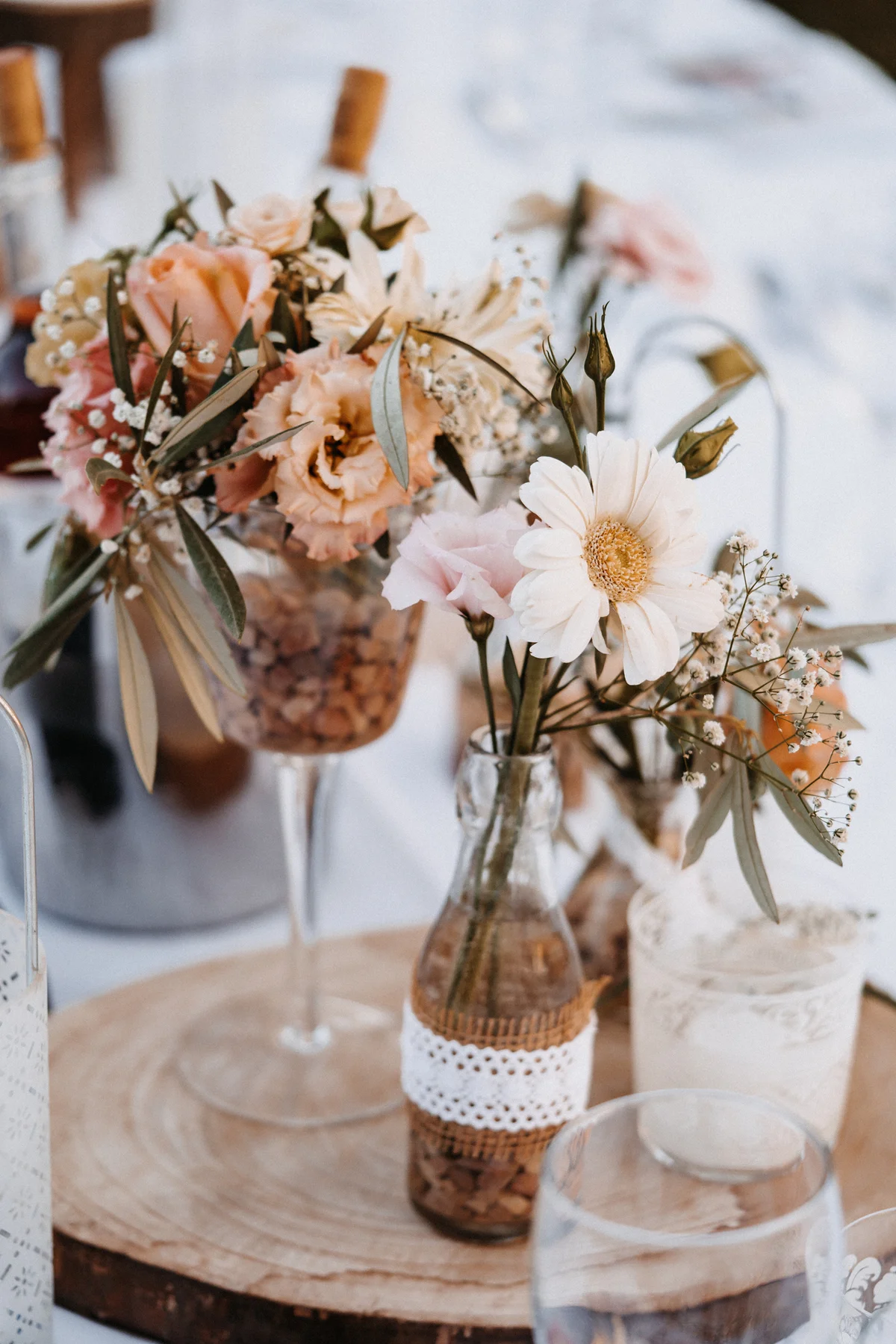 Wedding centerpiece with lace and wood details