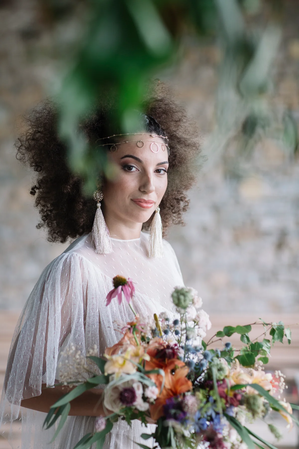 Boho bride wearing beautiful statement jewelry