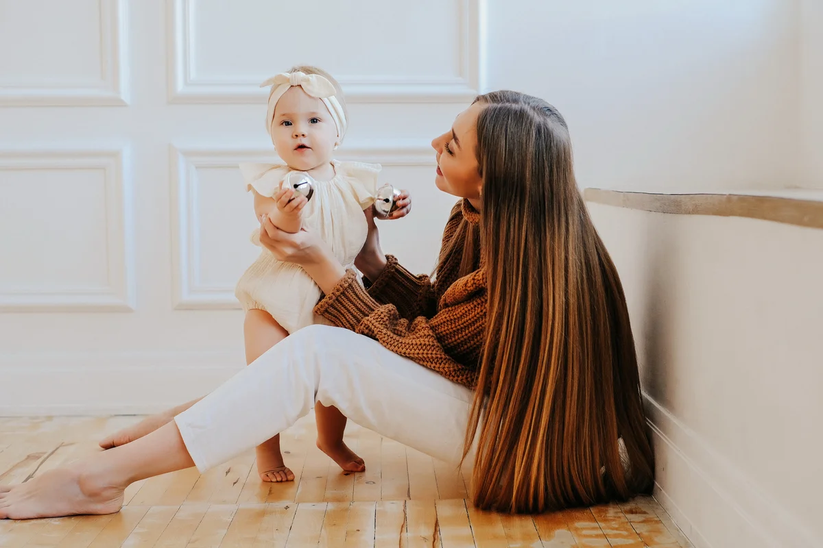 Mom on floor with her baby