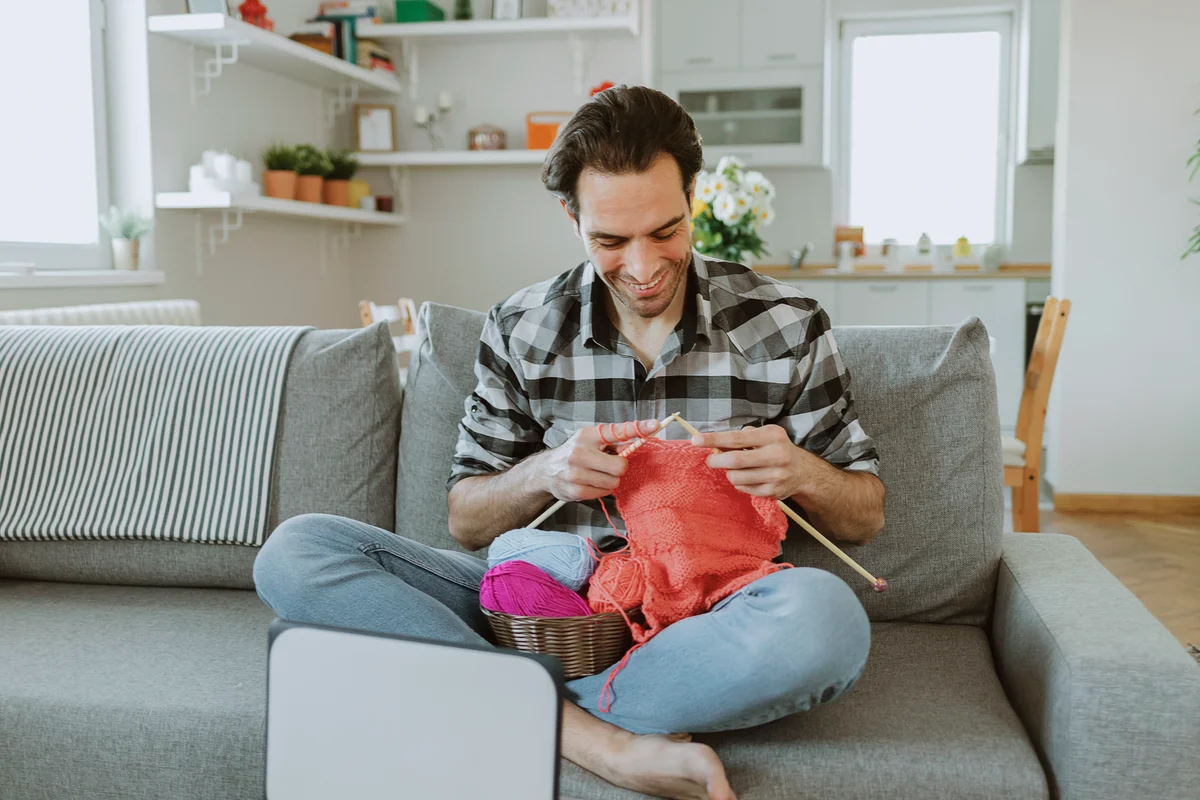 person knitting