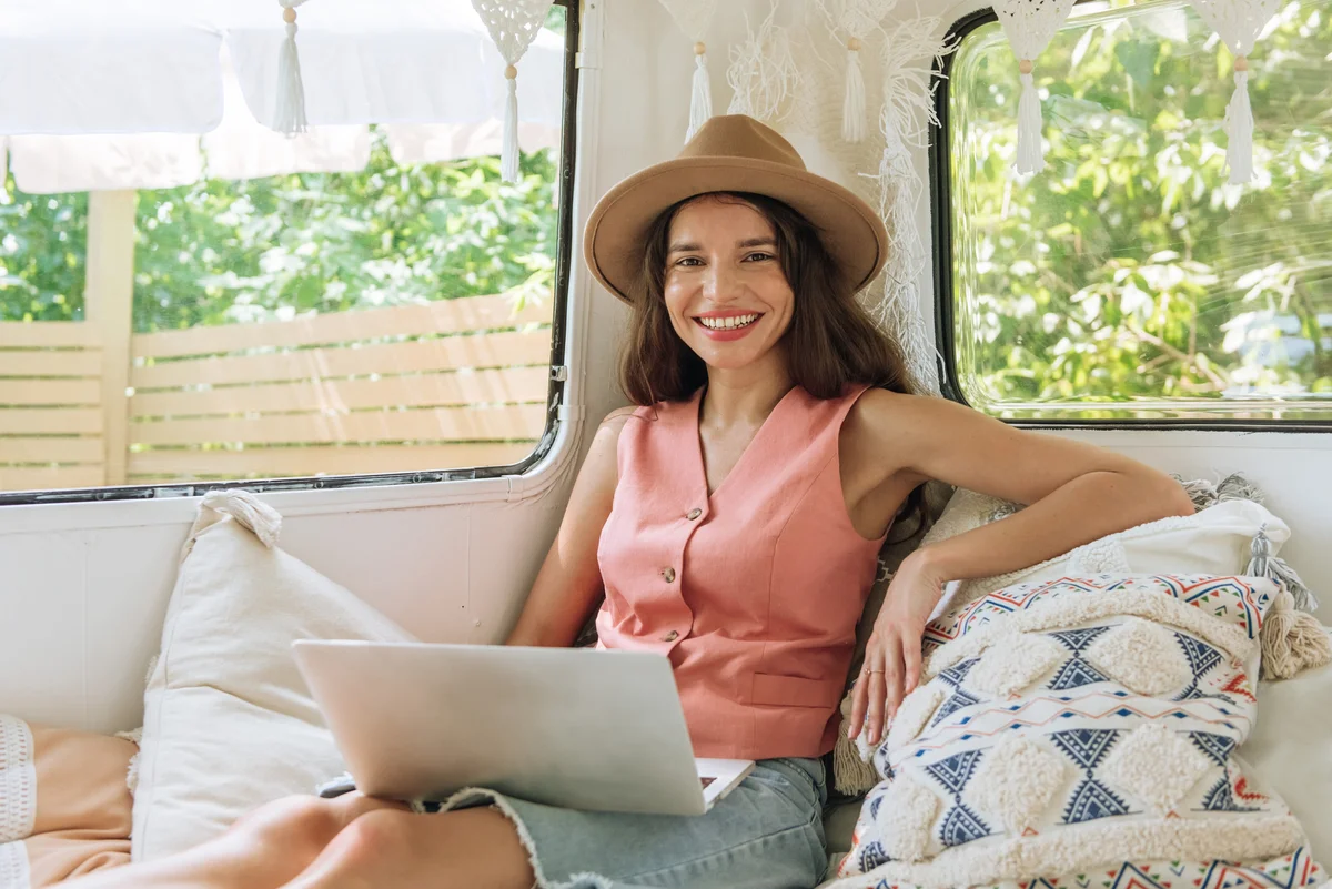 woman sitting in a camper